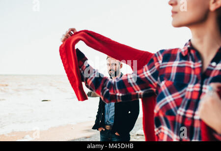 Mid adult man and girlfriend on beach, Odessa Oblast, Ukraine Stock Photo