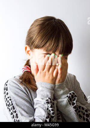 Portrait of a shy little girl close up Stock Photo