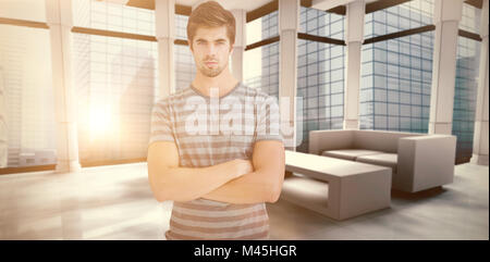 Composite image of portrait of confident businessman with arms crossed Stock Photo