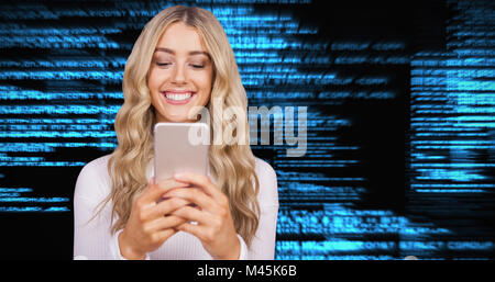 Composite image of beautiful blonde woman smiling and using smartphone Stock Photo