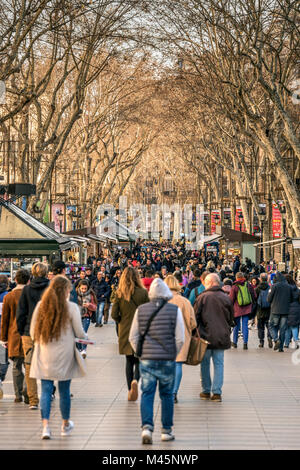 Tourists strolling on the famous Rambla pedestrian mall, Barcelona, Catalonia, Spain Stock Photo