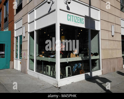 Customers on their various devices in the Citizens of Chelsea Coffee shop in Chelsea in New York on Tuesday, February 13, 2018. (Â© Richard B. Levine) Stock Photo