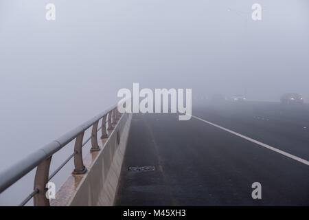 Abu Dhabi covered with the blanket of Dense Fog Stock Photo