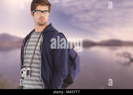 Composite image of confident man wearing eye glasses Stock Photo