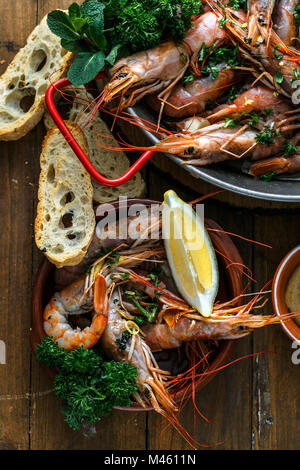 Tiger shrimps in a ceramic plate, close view, top view Stock Photo