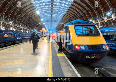 A train driver locks the cab at one end of an  Intercity 125 at Paddington Station in London, UK. Stock Photo