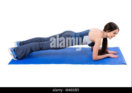 Young woman doing Elbow Plank Workout