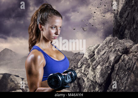 Composite image of side view of fit woman lifting dumbbell Stock Photo