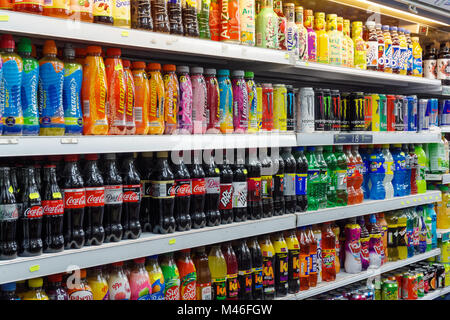 Sugary and fizzy drinks on shelf in local in supermarket, London England United Kingdom UK Stock Photo