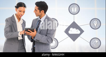 Composite image of business people discussing over digital tablet Stock Photo
