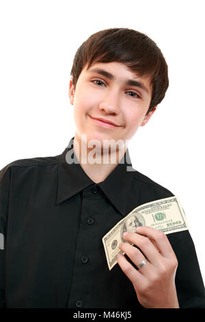 Happy teen in a dark shirt with a hundred dollar bill in hand.The joy of receiving the money Stock Photo