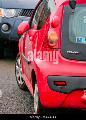 Cars damaged by the scrum during Ashbourne Royal Shrovetide hugball Football match Ash Wednesday 14th February 2018. Ye Olde & Ancient Medieval hugball game is the forerunner to football. It's played between two teams, the Up'Ards & Down'Ards separated by the Henmore Brook river. The goals are 3 miles apart at Sturston Mill & Clifton Mill. Stock Photo