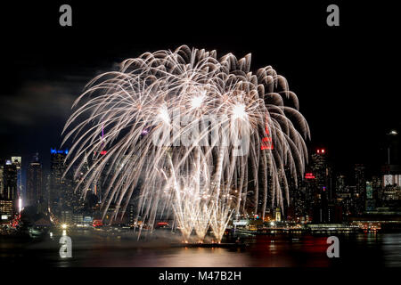New York, USA. 14th Feb, 2018. Fireworks light up the sky over the Hudson River in the celebrations of the Chinese Lunar New Year in New York, the United States, Feb. 14, 2018. Credit: Li Muzi/Xinhua/Alamy Live News Stock Photo
