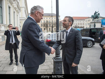 Munich, Germany. 15th Feb, 2018. Joachim Herrmann (CSU, L), Minister of Interior of the state of Bavaria, receiving Herbert Kickl (FPO), Austrian Minister of Interior, during the latter's inaugural visit to Munich, Germany, 15 February 2018. Credit: Lino Mirgeler/dpa/Alamy Live News Stock Photo