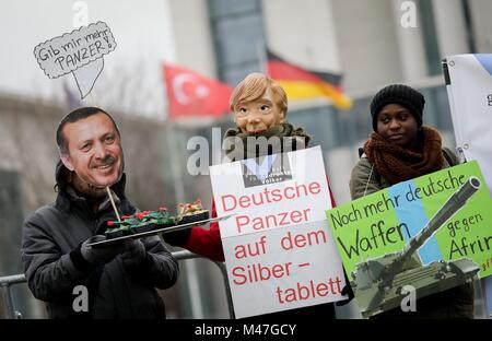 Berlin, Germany. 15th Feb, 2018. Representatives of the human rights action 'Society for Threatened Peoples' (GvbV) protest against German arms delivery to Turkey on the occasion of Turkish Prime Minister Yildirim's visit to German Chancellor Merkel in front of the Federal Chancellery in Berlin, Germany, 15 February 2018. Credit: Kay Nietfeld/dpa/Alamy Live News Stock Photo