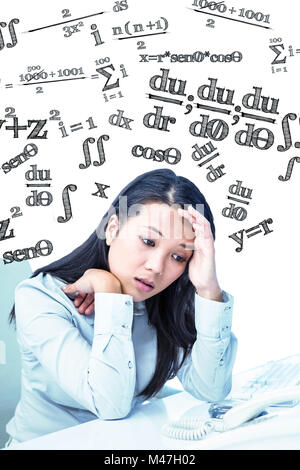 Composite image of unsmiling businesswoman with hands on face Stock Photo