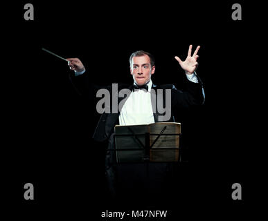 Shot of music director conducting with inspiration Stock Photo