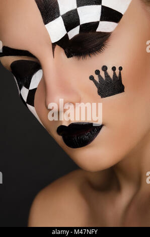 portrait of beautiful woman with black and white face art