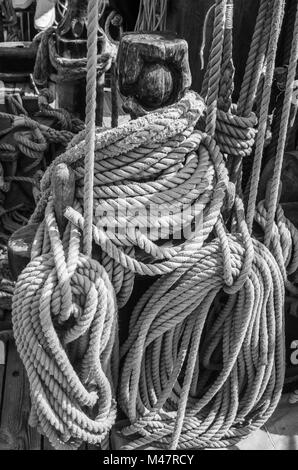 Blocks and rigging at the old sailboat, close-up Stock Photo