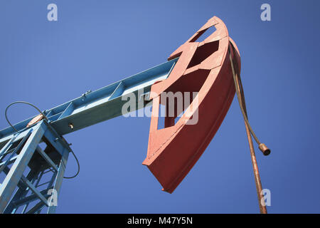 Work of oil pump jack on a oil field Stock Photo