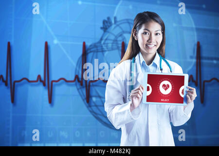 Composite image of asian doctor showwing her tablet Stock Photo