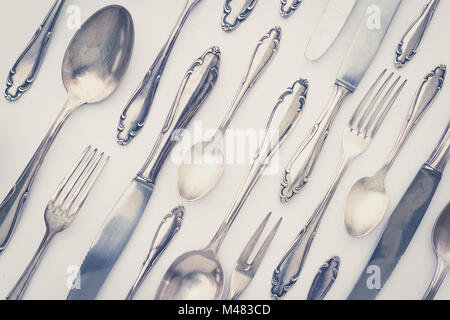 beautiful old silver cutlery - vintage style filter Stock Photo