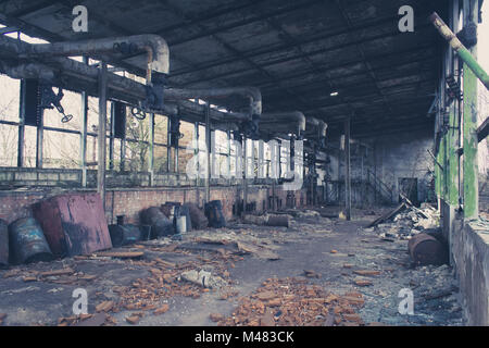 old abandoned warehouse , empty messy factory Stock Photo