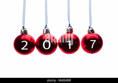 Four red christmas balls with new year 2017 numbers Stock Photo