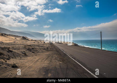 Panamericana road with Pacific ocean on the right Stock Photo