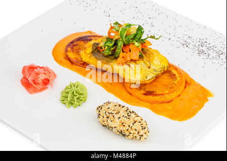 Cod sliced fillet fried in tom yam sauce Stock Photo