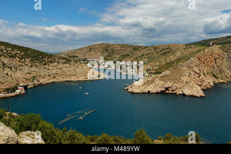 Balaklava is popular Crimean resort. Bay former submarine base. Stock Photo