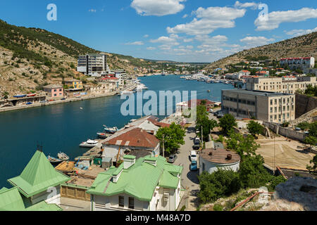 Balaklava is popular Crimean resort. Bay former submarine base. Stock Photo