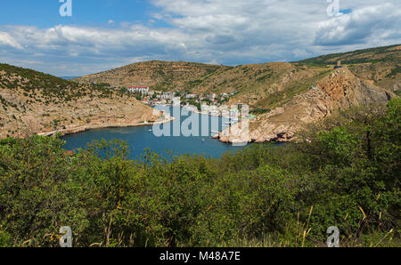 Balaklava is popular Crimean resort. Bay former submarine base. Stock Photo