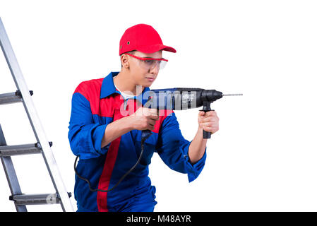 Young repairman with drill perforator isolated on white Stock Photo