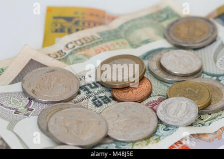 An assortment of foreign coins and bank notes Stock Photo