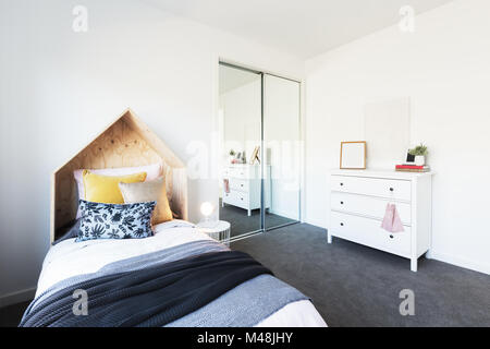 Gorgeous young girl's bedroom beautifully styled Stock Photo