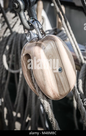 Blocks and rigging at the old sailboat, close-up Stock Photo