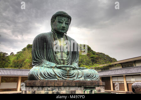 Kamakura, Japan - famous Great Buddha statue (Daibutsu) in Kotoku-in buddhist temple. Kanagawa prefecture of Japan. Stock Photo