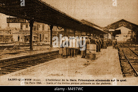 WWI - German prisoners of War on the railway station platform at Saint-Quentin, Aisne, France