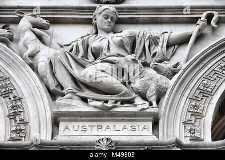 London, United Kingdom - sculpture in facade of Foreign and Commonwealth Office. Allegory of Australasia. Stock Photo