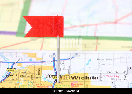 Wichita, Kansas. Red flag pin on an old map showing travel destination. Stock Photo
