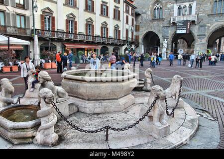 BERGAMO, ITALY - OCTOBER 20: People visit Old Town on October 20, 2012 in Bergamo, Italy. In 2011 841,624 tourists visited Bergamo Province, among the Stock Photo