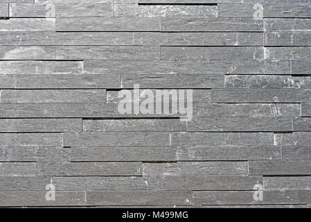 Background from a grey granite tiled wall Stock Photo