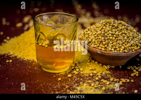 Close up of water of Coriandrum sativum,Coriander with its powder. Stock Photo