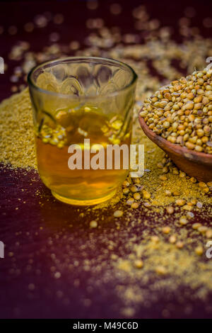 Close up of water of Coriandrum sativum,Coriander with its powder. Stock Photo