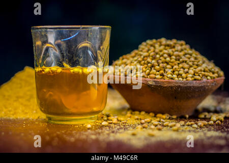 Close up of water of Coriandrum sativum,Coriander with its powder. Stock Photo