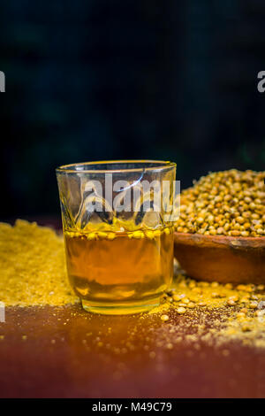 Close up of water of Coriandrum sativum,Coriander with its powder. Stock Photo