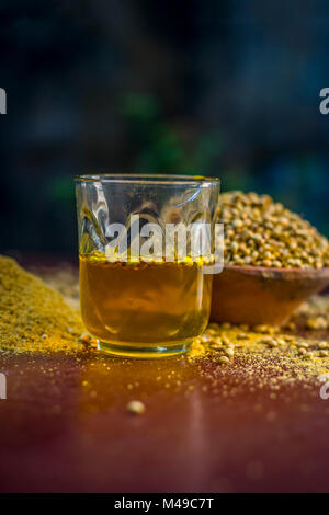 Close up of water of Coriandrum sativum,Coriander with its powder. Stock Photo