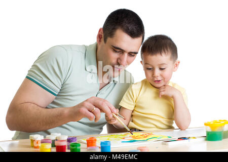young smiling father painting with son Stock Photo