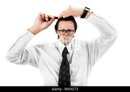 combing busines man with small head and big hands maliciously looking into the camera, isolated on white background Stock Photo